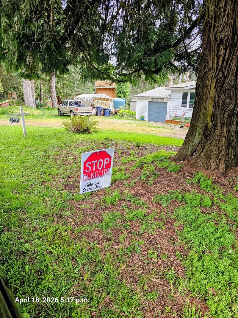 Stop Genocide sign on Whalebone Drive, Gabriola