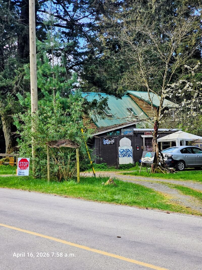 Stop Genocide sign at Juan's Juorld, South Road, Gabriola