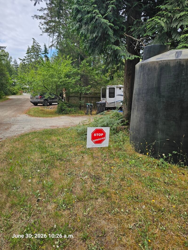 Lenore's Stop Genocide sign on Little Road, Gabriola