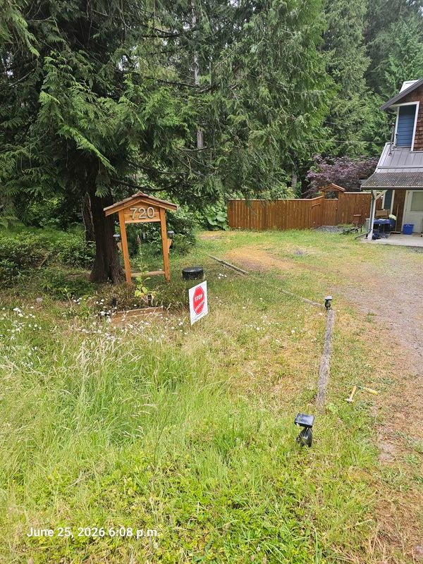 Monna's Stop Genocide sign on Clarendon Road, Gabriola
