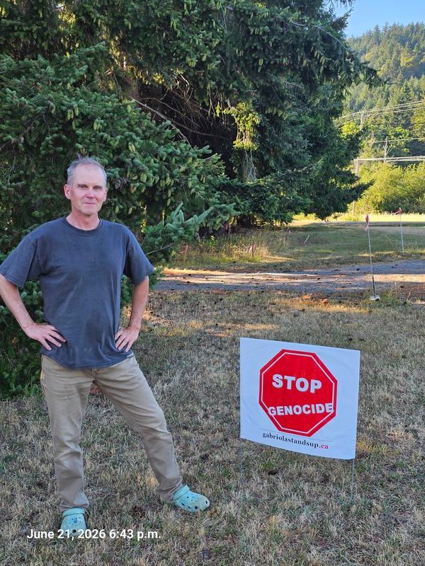 Neil's Stop Genocide sign on El Verano, Gabriola