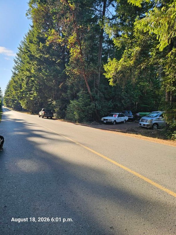 Neil's Stop Genocide sign on Malaspina Drive, Gabriola - sign #112
